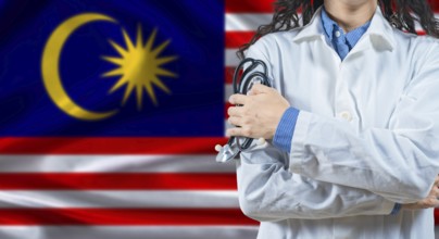 Malaysian healthcare professional with Malaysia flag background. Professional doctor holding