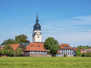 The village of Apfelstädt with the church of St. Walpurgis and half-timbered houses, Thuringia,