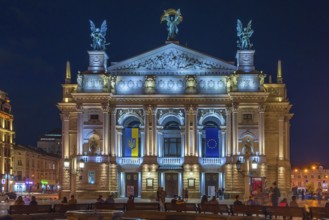 Opera house illuminated at night, Lviv, Ukraine