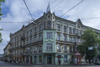 19th century dilapidated tenement house, restored bay window, Lemberg, Ukraine