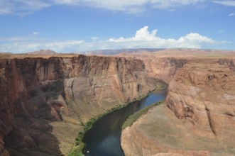 Aerial view of a deep gorge with the Colorado River flowing through, Horseshoe Bend, Arizona, USA