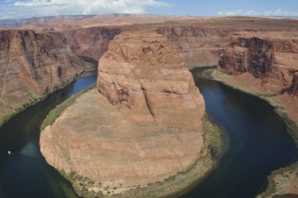 The distinctive rock formation at Horseshoe Bend, surrounded by the Colorado River, Arizona, USA