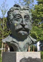 Brescello, statue of the writer Giovannino Guareschi in Parco Giovannino Guareschi, author of the