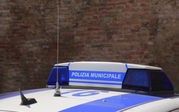 Polizia municipale, police car in Italy, marking on the roof of the car, lettering