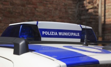 Polizia municipale, police car in Italy, marking on the roof of the car, lettering. Polizia