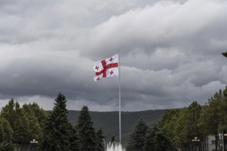 The Georgian flag flying in Stalin Park near the Stain Museum on Stalin Avenue, Gori, Georgia