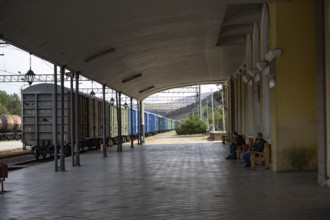Gori, Georgia. September 10th 2025. Freight train carriages at the platform of Gori railway station