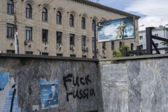 Gori, Georgia. September 10th 2025. Anti-Russia graffiti sprayed on a subway wall with a billboard