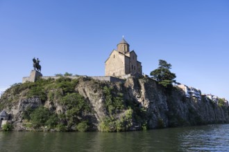 Tbilisi, Georgia. July 13th 2025. Metekhi Church of the Nativity and the Virgin Mary overlooking