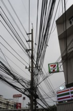 Bangkok, Thailand. March 4th 2025. A tangled mess of cables and wires used for phone and internet