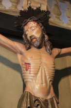 Italy, village of Brescello, cross from the movie, Don Camillo and Peppone in the church of