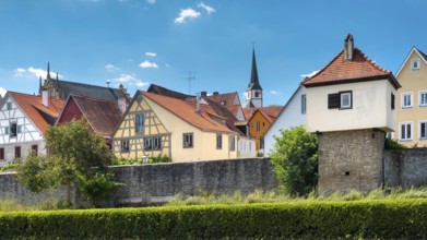 City wall, church defence tower, defensive tower, residential tower and half-timbered houses in