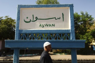 Aswan, Egypt. January 7th 2013 Sign for the city of Aswan on the platform of Aswan train station in