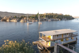 Aswan, Egypt. December 9th 2022 Beautiful scenic view of an Egyptian house boat on the River Nile