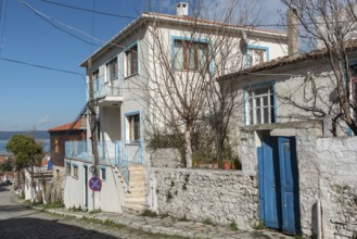 Canakkale, Turkey. February 18th 2022 Pretty blue painted houses in the village of Kilitbahir on