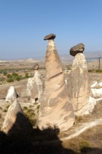 Beautiful morning light on the fairy chimney rock formations known as the Three Graces, part of the