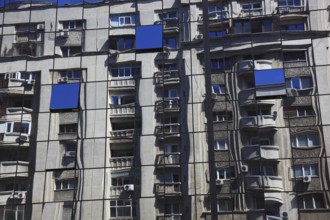 Romania, capital city Bucharest, Bucuresti, reflection in a glass façade