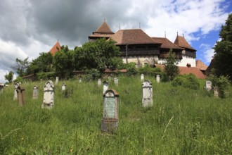 Romania, the fortified church and cemetery of Viscri, German German Weisskirch a town in the