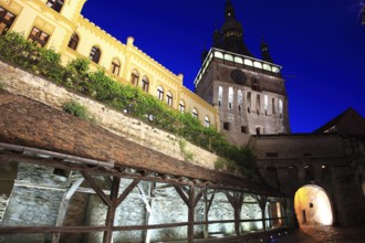 Romania, the hour tower at the blue hour in the historic old town of Sighisoara, German Sighisoara,