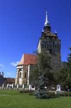 Romania, the church tower and church of Saschiz, German Keisd, a community in Mures County,