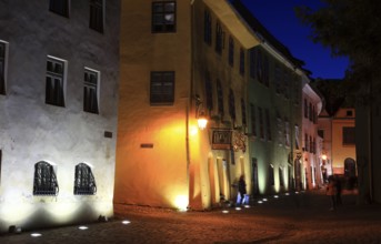 Romania, at blue hour in the historic old town of Sighisoara, German Sighisoara, city in Mures