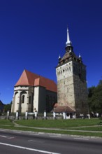 Romania, the church tower and church of Saschiz, German Keisd, a community in Mures County,