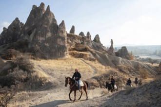 Cappadocia, Turkey. November 8th 2017 Canan leads a group of tourist's horse trekking through the
