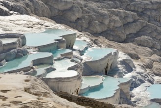 Pamukkale Travertine Terraces, amazing aqua blue pools of thermal mineral rich spring water set