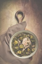 Chakapuli, Georgian dish, stewed meat with herbs and tkemali, in white wine, homemade, no people