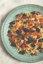 Rice dish, with the addition of dried fruits, nuts and spices of Middle Eastern cuisine, homemade,