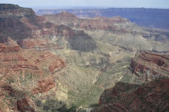 Steep canyons and valleys stretch through an earthy and vast landscape, Grand Canyon National Park,