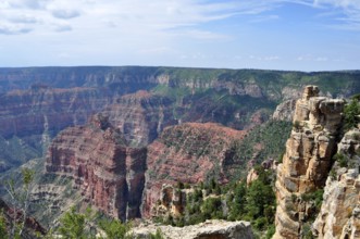 Rocky canyons and rock walls under a wide sky offer far-reaching views of nature, Grand Canyon