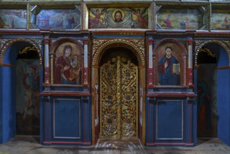 Gilded door in the 16th century Gothic wooden church of St. Paraskevi, Radruz, Poland