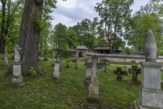 Cemetery with 16th century Gothic wooden church of St. Paraskevi, Radruz, Poland