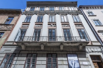 House façade with reliefs of the four seasons from the 19th century, Lemberg, Ukraine