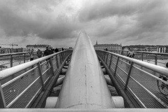 Father Bernatka wooden walkway, modern bridge over the Vistula, black and white, Krakow, Poland
