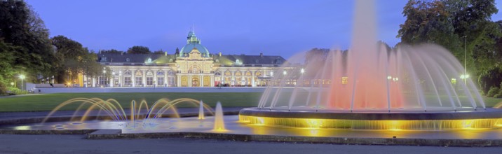 Spa garden with imperial palace illuminated panorama of Bad Oeynhausen Germany