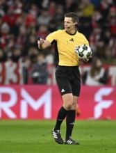 Referee Daniel Siebert with match ball gesture soccer Bundesliga, DFB-Pokal, Allianz Arena, Munich,
