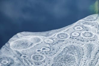 Abstract patterns in the ice of the partly frozen Königssee, detailed view, Berchtesgaden National