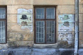 Wall painting at a former Jewish hat shop in the Jewish Quarter in Lemberg, Ukraine