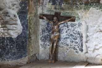 Interior frescoes and crucifix of the chapel in the fortified church of Honigberg, Harman,