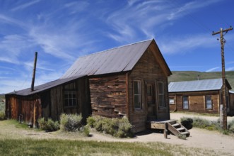 Rustic wooden house under a clear sky in an abandoned town, Bodie Ghost Town, California, USA