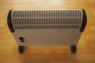Electric radiator, electric heating, mobile, parquet, building technology, energy costs, Stuttgart,