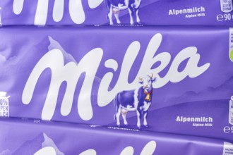Milka chocolate 90g bar chocolate bar alpine milk chocolate background with logo in Stuttgart,