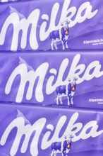Milka chocolate 90g bar chocolate bar alpine milk chocolate background with logo in Stuttgart,