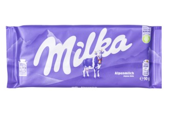 Milka chocolate 90g bar chocolate bar Alpine milk chocolates isolated against a white background