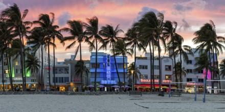 Miami Beach Florida building on Ocean Drive in art deco architecture style panorama at night in