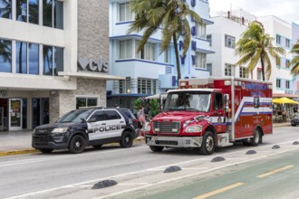 Fire and Police Car Fire Truck Police Car on Ocean Drive in Miami Beach, USA