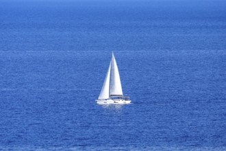 Sailing boat in the Mediterranean Aegean Sea vacation off the island of Rhodes, Greece
