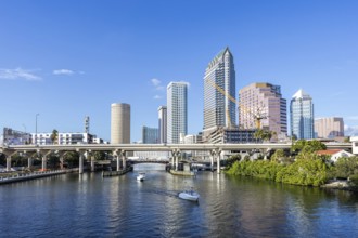 Tampa skyline with skyscrapers and bridge over Hillsborough River downtown in Tampa, USA